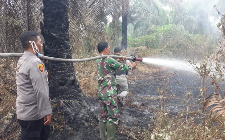 Soliditas TNI-Polri Dalam Mengatasi Kebakaran Lahan Masyarakat
