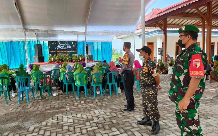 Sertu Sudibyo pastikan kegiatan berjalan aman dan lancar. Sabtu (14/05/2022)