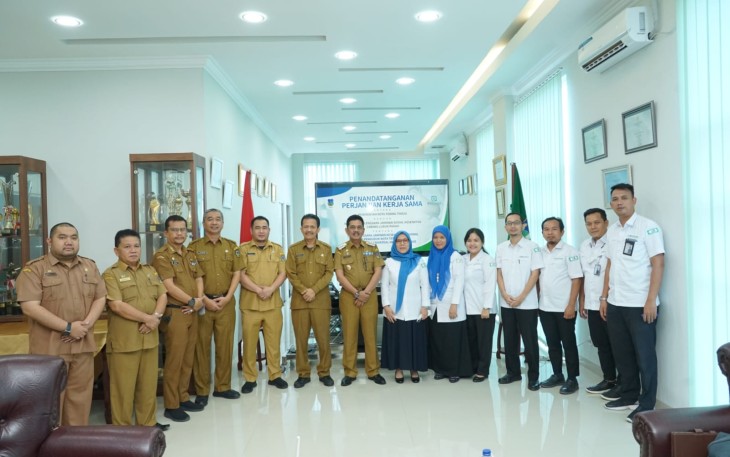 Pemkot Tebing Tinggi dan BPJS Kesehatan Cabang Lubuk Pakam saat Lakukan Penandatanganan MoU Terkait Sistem Penjamin Kesehatan 