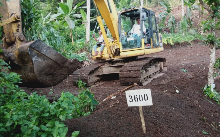 Capaian pekerjaan pembukaan jalan pertanian oleh satgas TMMD Ke-116 Kodim 1310/Bitung di hari ke-25