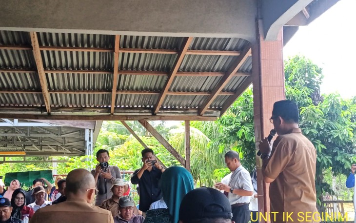 Bhabinkamtibmas Hadiri Panen Ikan Patin oleh Bupati Gusnan Mulyadi