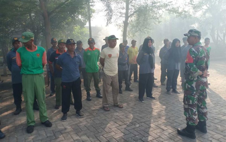 Pembersihan lingkungan di wilayah desa binaan 