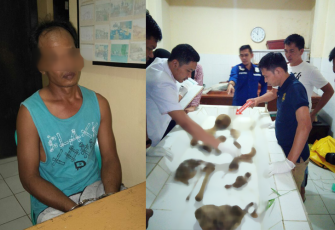 Terduga pelaku NA (47) saat diperiksa pihak kepolisian