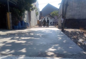Jalan sasaran TMMD setelah selesai pengecoran 