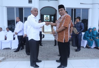 Bupati Asahan Surya (kiri) pada peringatan HKN ke 55