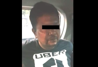 HT (41) terduga pelaku pembunuhan terhadap satu keluarga di Desa Duwet Kecamatan Baki Kabupaten Sukoharjo Jawa Tengah saat dibekuk aparat kepolisian.