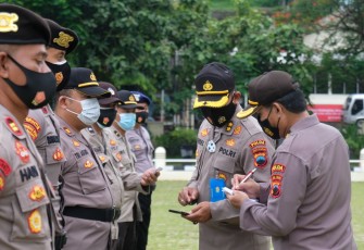 Apel Konsolidasi dan Pemeriksaan Keadaan Personil BKO Pilkada Serentak Di Wilayah Jateng yang bertempat di Lapangan Mapolda Jateng