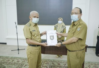 Foto Serah Terima Laporan Pelaksanaan Tugas Pjs Bupati Asahan 