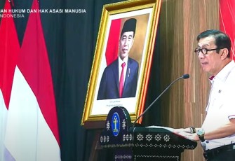 Menkumham RI saat sambutan mengenai indeks pelayanan publik di Jakarta 