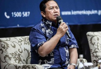 Ahmad Zabadi saat menyampaikan draf RUU Perkoperasian di Bali