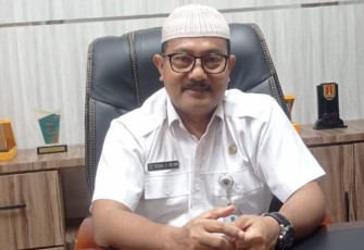 Teguh S selaku Kepala Bakeuda Kabupaten Pasaman diruang kerjanya 