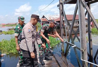 Peresmian pemanfaatan air bersih Program TNI AD Manunggal Air di Awang Landas Desa Sungai Buluh Kecamatan Labuan Amas Utara Kab.Hulu Sungai Tengah. Selasa (06/02).