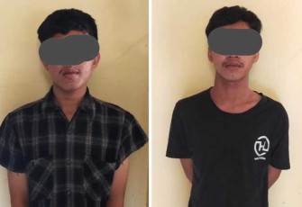 Tersangka (diborgol) saat diamankan