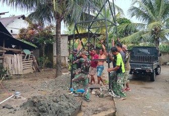 Semangat Gotong Royong Warga Bangun Tower Air Bersama Satgas TMMD Ke-124 Kodim 0408/BS