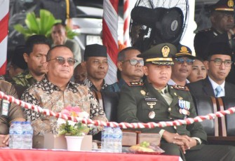 Dandim 1710/Mimika Letkol Inf M. Slamet Wijaya, S.Sos,.M.Han,.M.A saat menghadiri upacara peringatan HUT Bhayangkara Ke-79 Tahun 2025