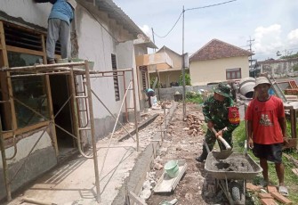 Kerja bakti di wilayah desa binaan