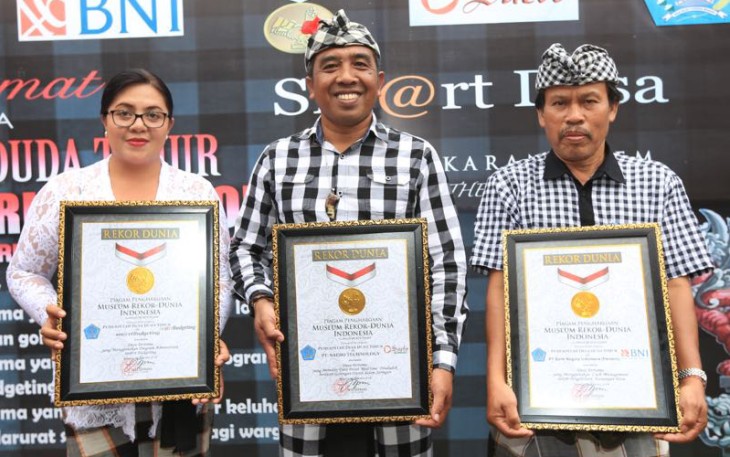 Desa Duda Timur, Kecamatan Selat, Kabupaten Karangasem, Bali meraih tiga rekor Museum Rekor-Dunia Indonesia (MURI) 