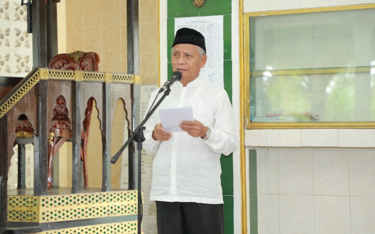 Plt. Bupati Asahan, Surya saat menyampaikan sambutan dalam acara Haul PMDU Asahan-Kisaran ke 25 di