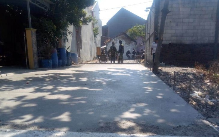Jalan sasaran TMMD setelah selesai pengecoran 