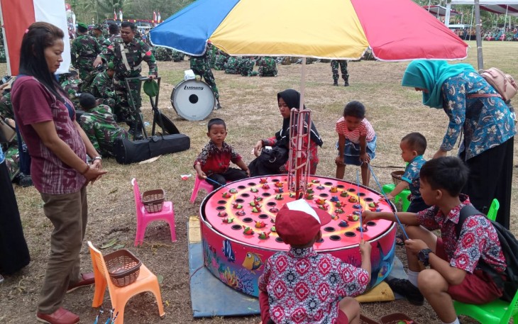 Pembukaan TMMD Cilacap Membawa Berkah Wahana Permainan Memancing Kodok