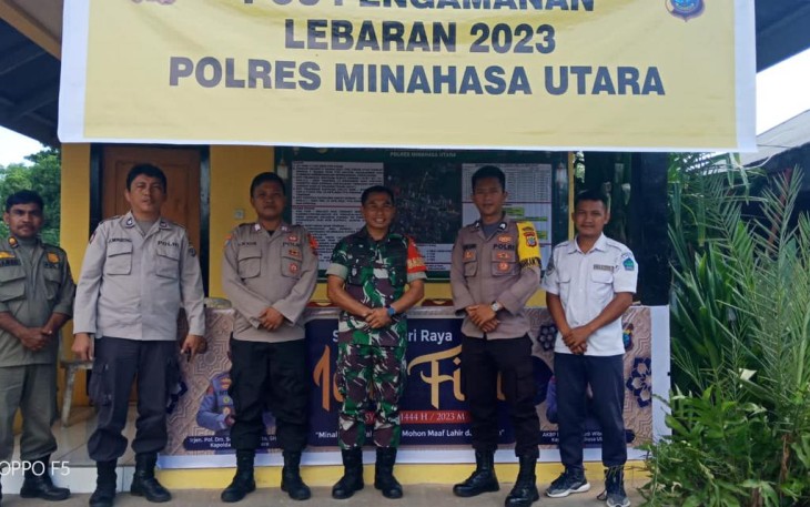 Personil kodim 1310/Bitung bersama instansi terkait saat melaksanakan pengamanan di pos penjaga arus mudik lebaran