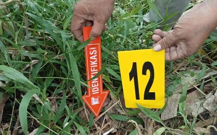 Polisi saat identifikasi di TKP