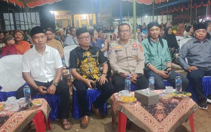 Kanit Binmas Polsek Belitang III Hadiri Acara Bersih Desa Karya Makmur
