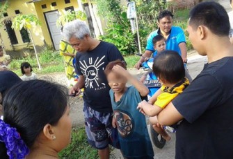 Ju saat ditangkap oleh warga 