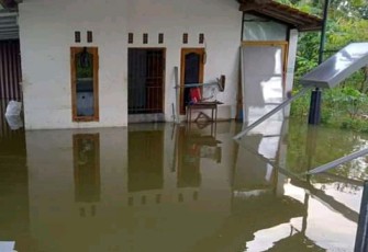 Salah satu rumah warga yang terendam Banjir