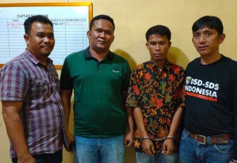 Tersangka (diborgol)