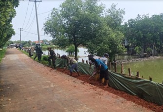 Pengerjaan Peningkatan dan Pelebaran Jalan