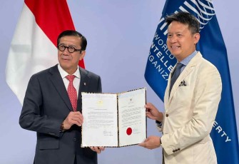 Menkumham Yasonna Laoly bersama Dirjen WIPO Daren Tang di Swiss