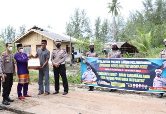 Satlantas Polres Lingga Gelar Vaksinasi dan Bansos
