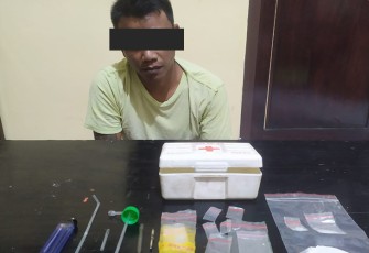 Tersangka dan barang bukti saat diamankan
