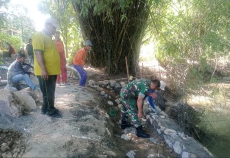 Pembuatan talud di wilayah desa binaan 
