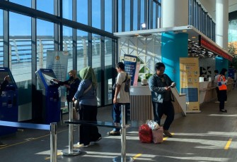 Ilustrasi penumpang ASDP menggunakan aplikasi Ferizy 