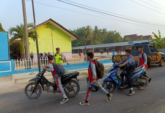 Polsek Belitang III Rutin Melaksanakan Pengaturan Arus Lalulintas 