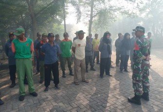 Pembersihan lingkungan di wilayah desa binaan 