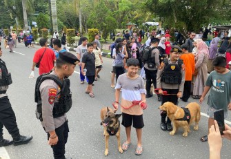 Ditsamapta Polda Kalteng Gelar Patroli Sepeda dan Kenalkan Satwa K-9