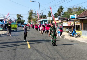 Babinsa Koramil 0801/11 Donorojo Kawal Jalan Sehat Murid Paud