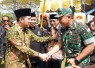 Danrem 081/DSJ Kolonel Arm Untoro Hariyanto menghadiri kegiatan Suran Agung yang digelar Persaudaraan Setia Hati Winongo Tunas Muda (PSHWTM) di Lapangan Winongo, Manguharjo, Kota Madiun, Minggu (28/6/2026)